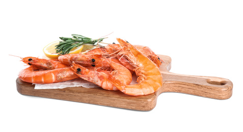 Photo of Delicious cooked shrimps served with lemon and rosemary on white background