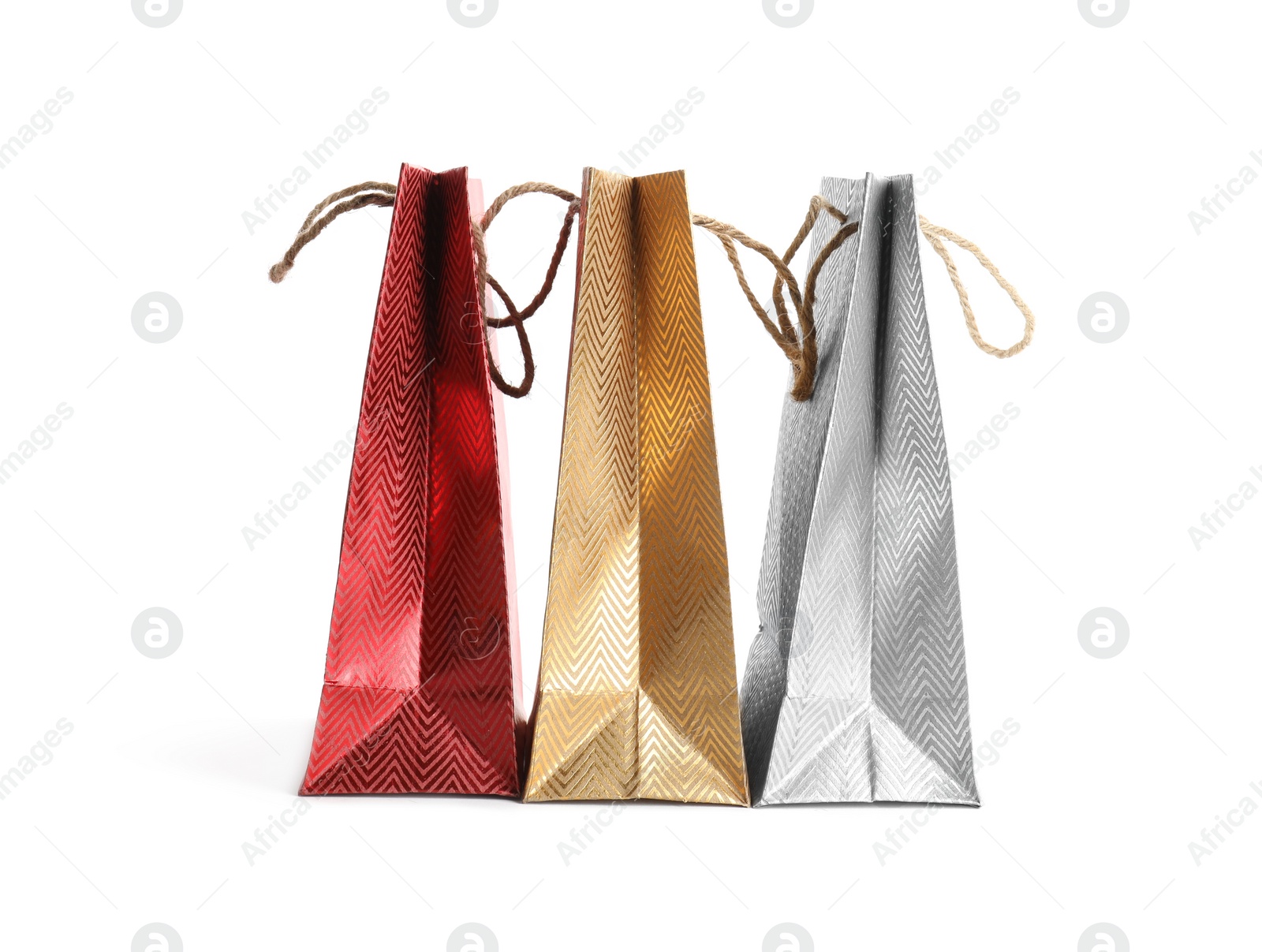 Photo of Color paper shopping bags isolated on white