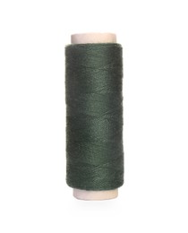 Photo of Spool of dark green sewing thread isolated on white