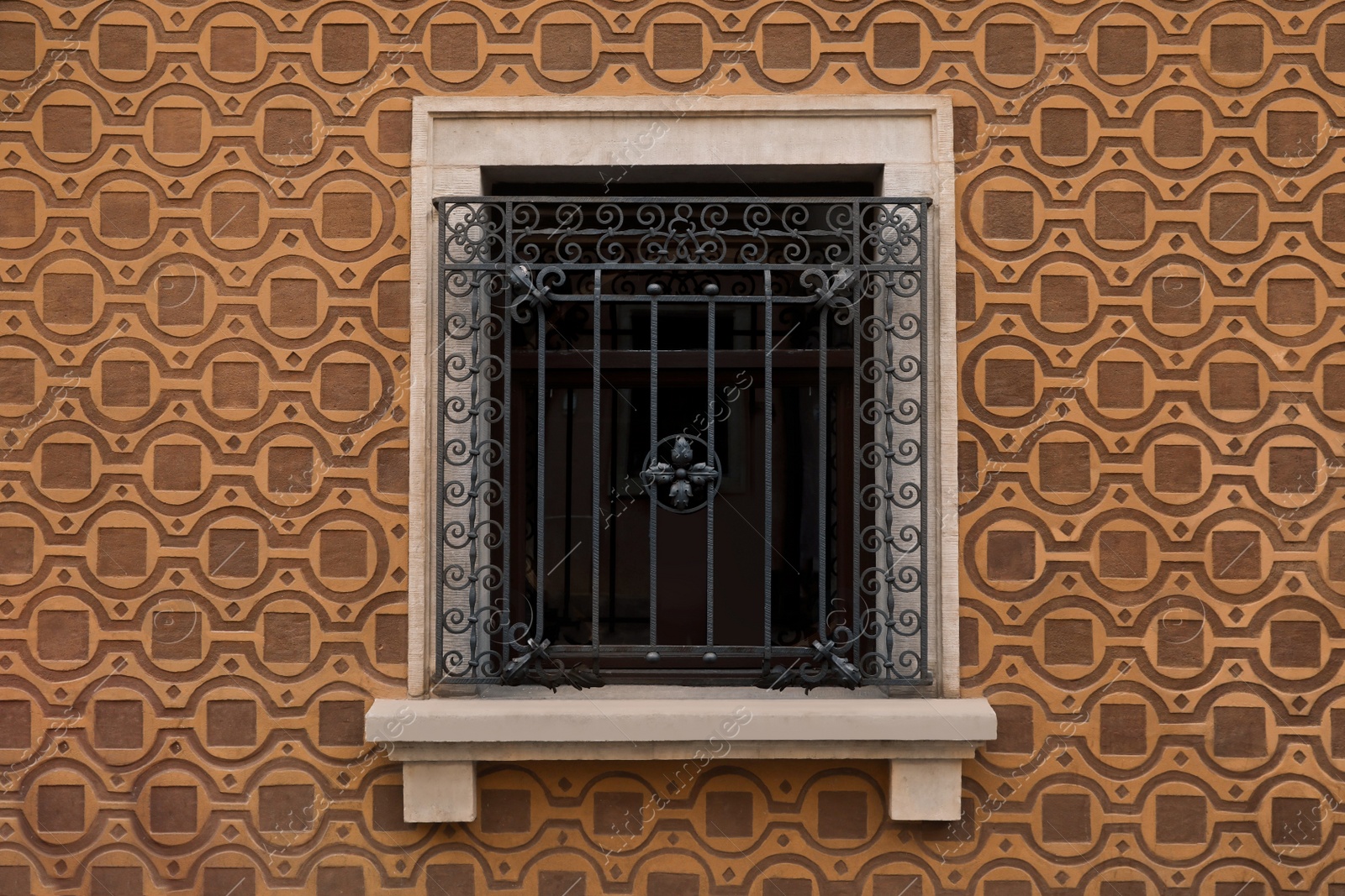Photo of Beautiful window with grills in building outdoors