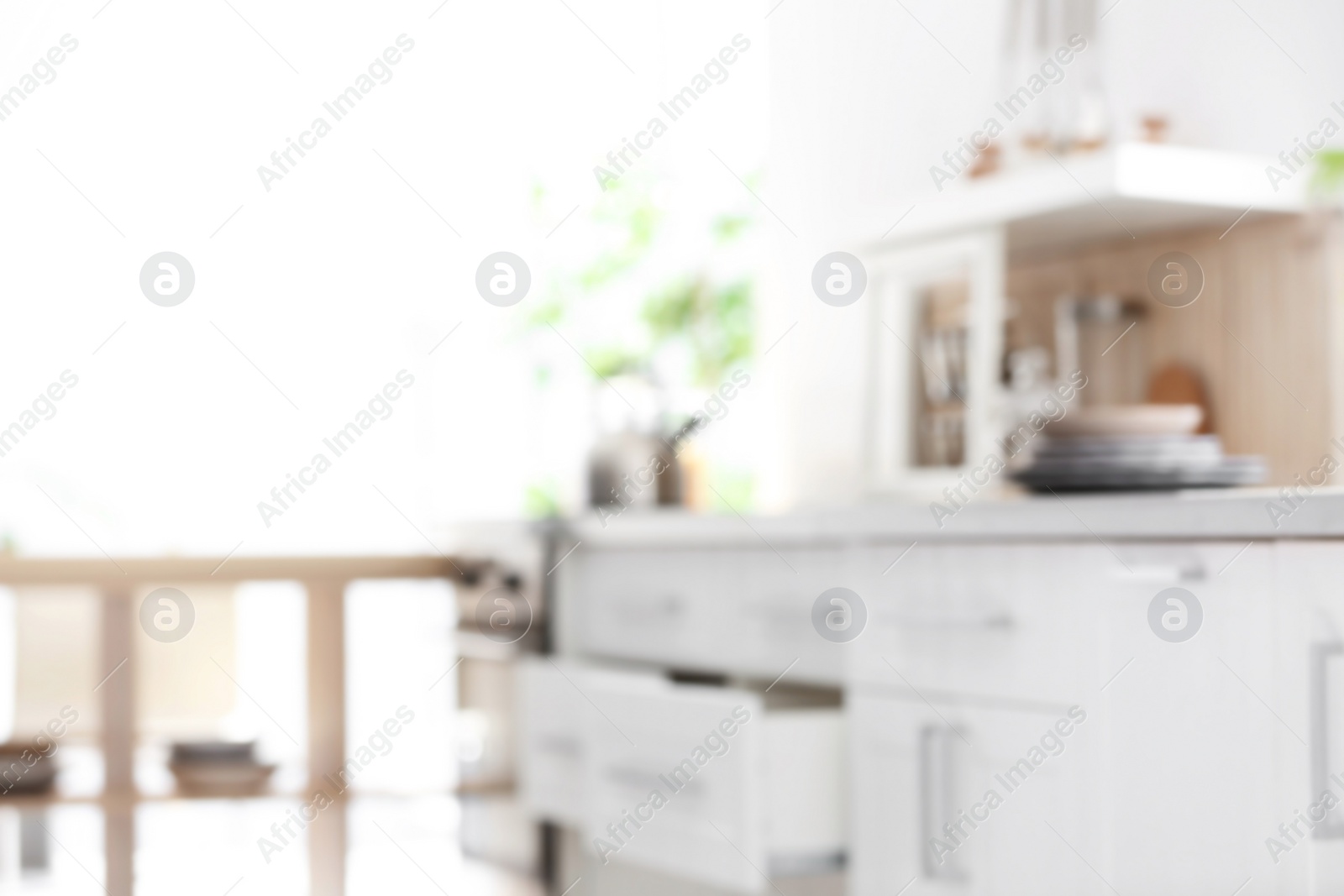 Photo of Blurred view of kitchen interior setting. Idea for home design