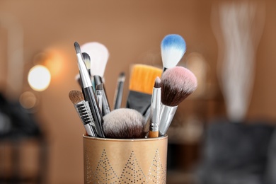 Holder with makeup brushes, closeup