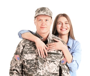 Photo of Male soldier with his wife on white background. Military service