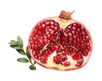 Half of fresh pomegranate and branch isolated on white, top view