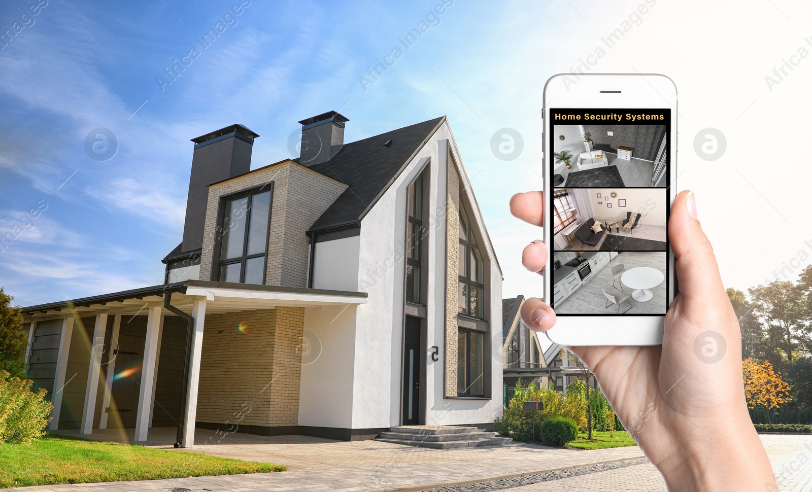 Image of Alarm system. Woman monitoring modern CCTV cameras on smartphone near her house, closeup