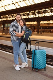Photo of Long-distance relationship. Beautiful couple on platform of railway station