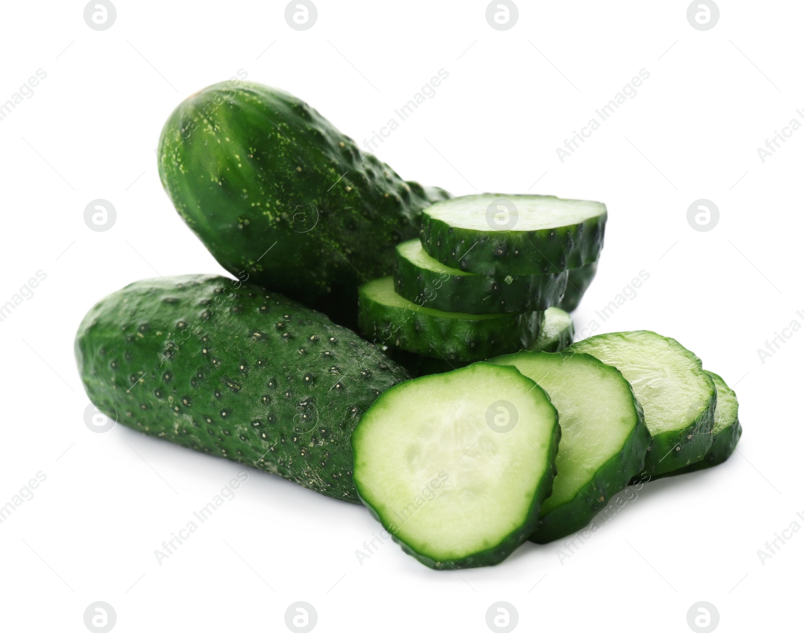 Photo of Whole and cut cucumbers on white background