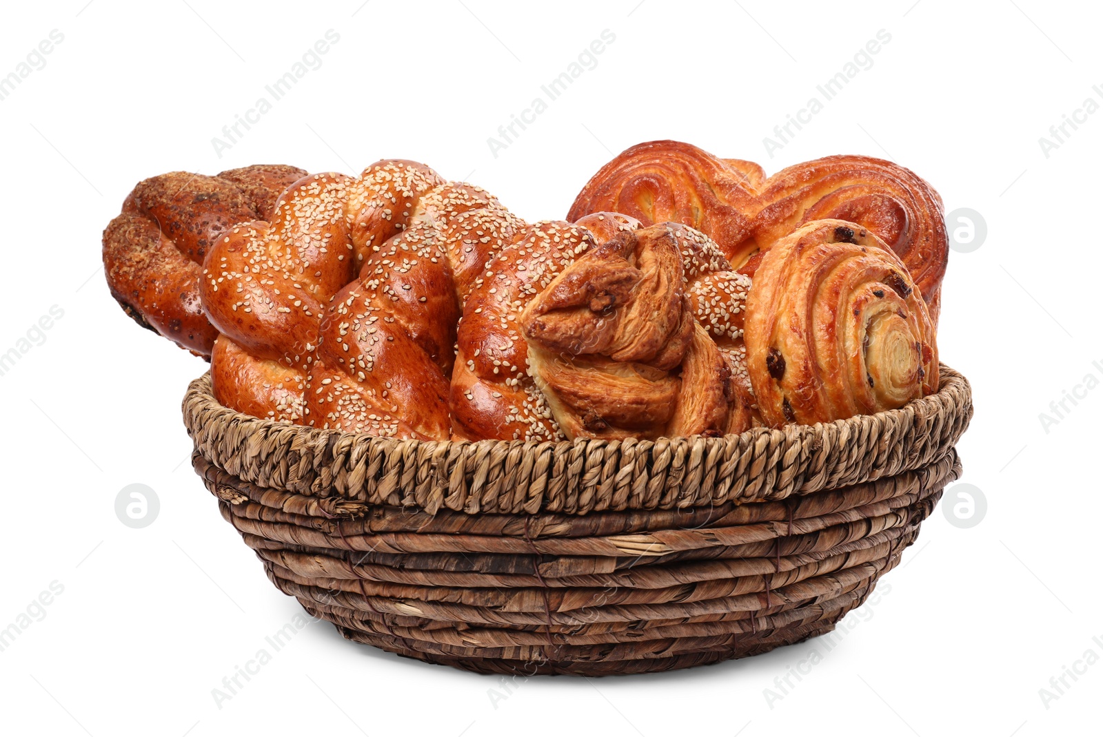 Photo of Different tasty pastries in wicker basket isolated on white