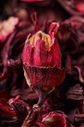 Dry hibiscus tea as background, closeup view