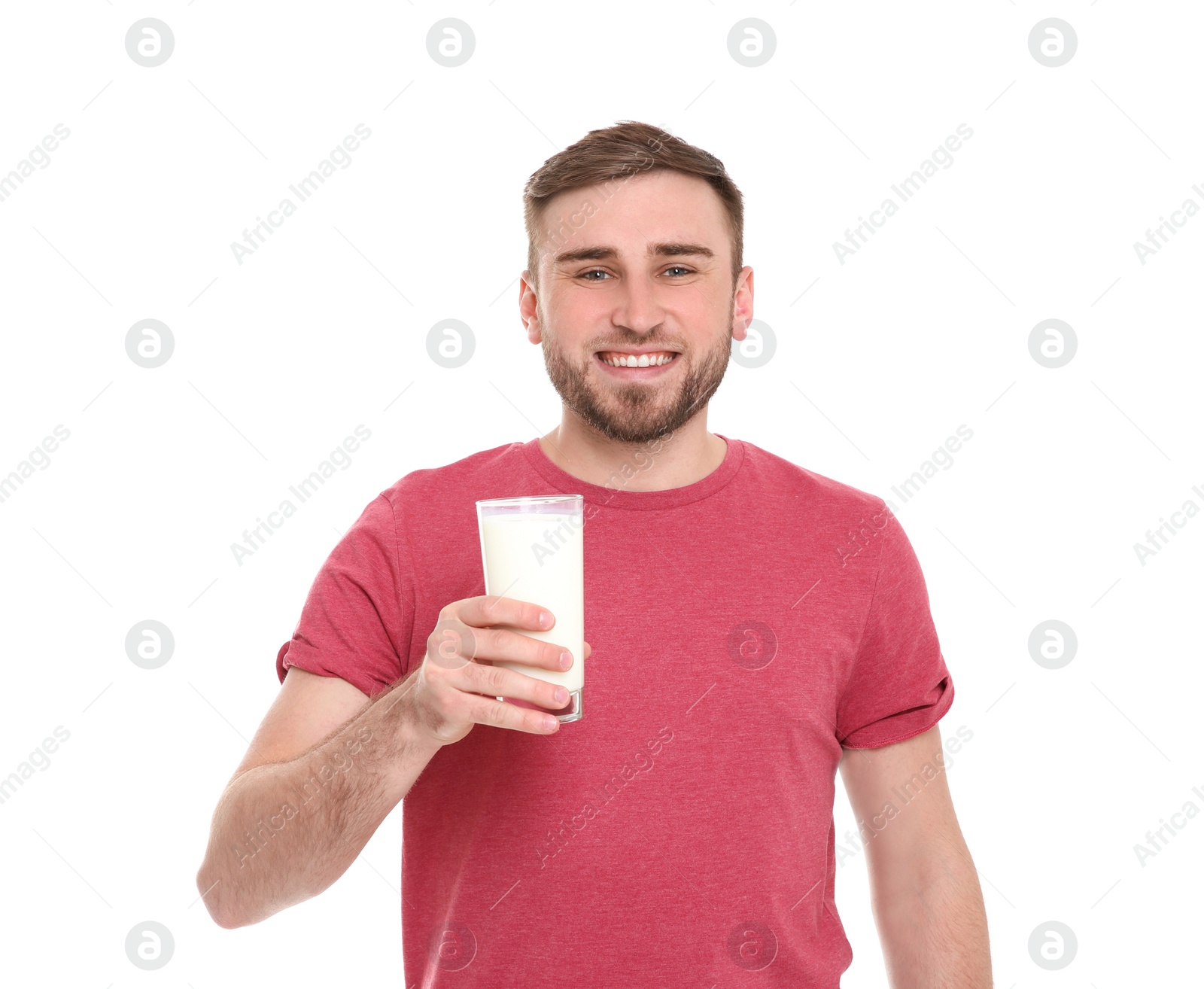 Photo of Young man with glass of tasty milk on white background