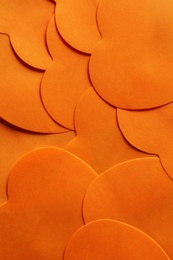 Texture of beautiful orange material as background, closeup