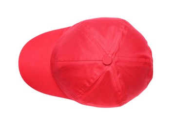 Photo of Stylish red baseball cap isolated on white, top view