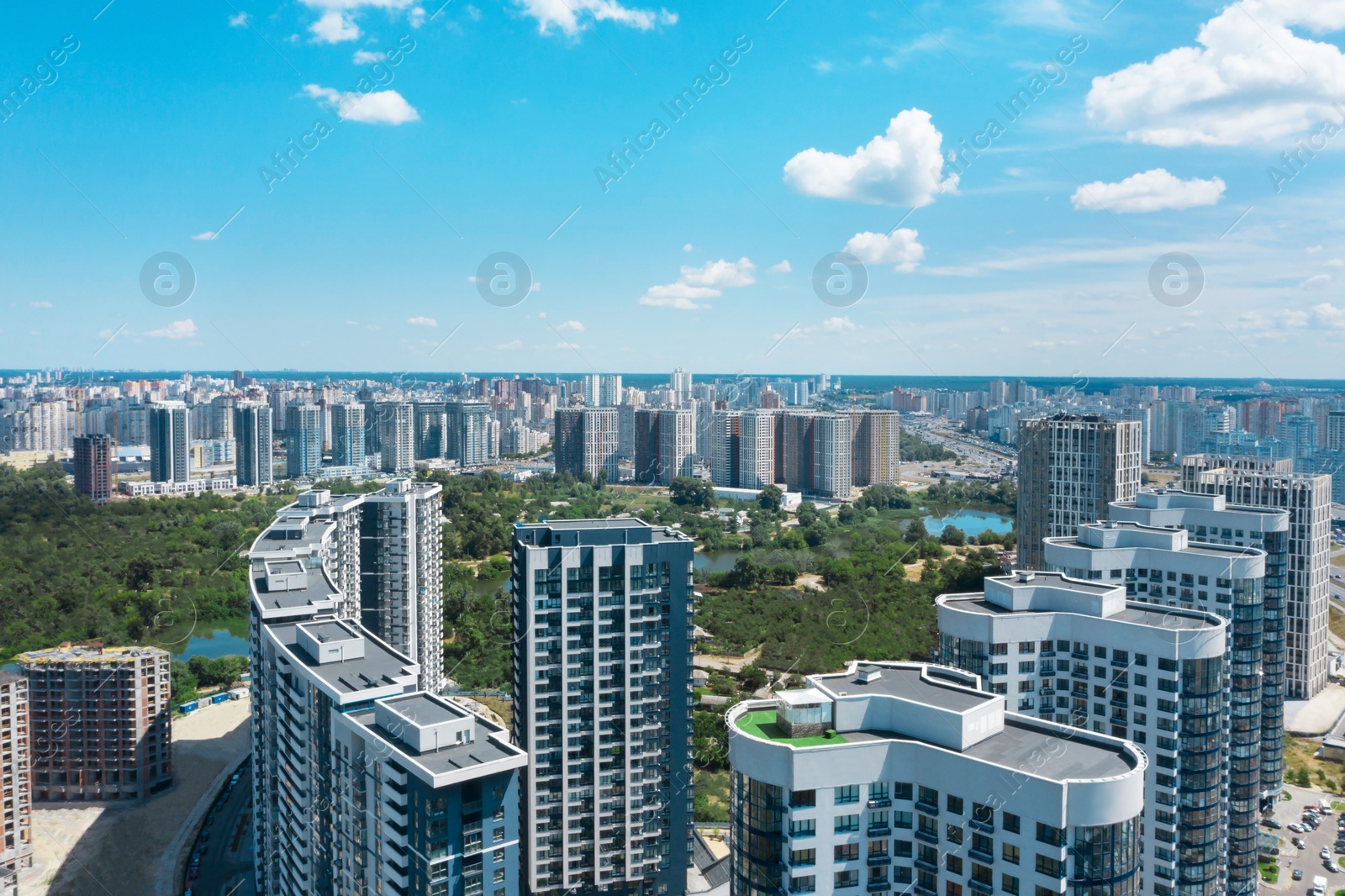 Image of Aerial view of modern buildings in city center