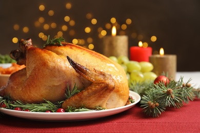 Photo of Delicious roasted turkey served on festive table