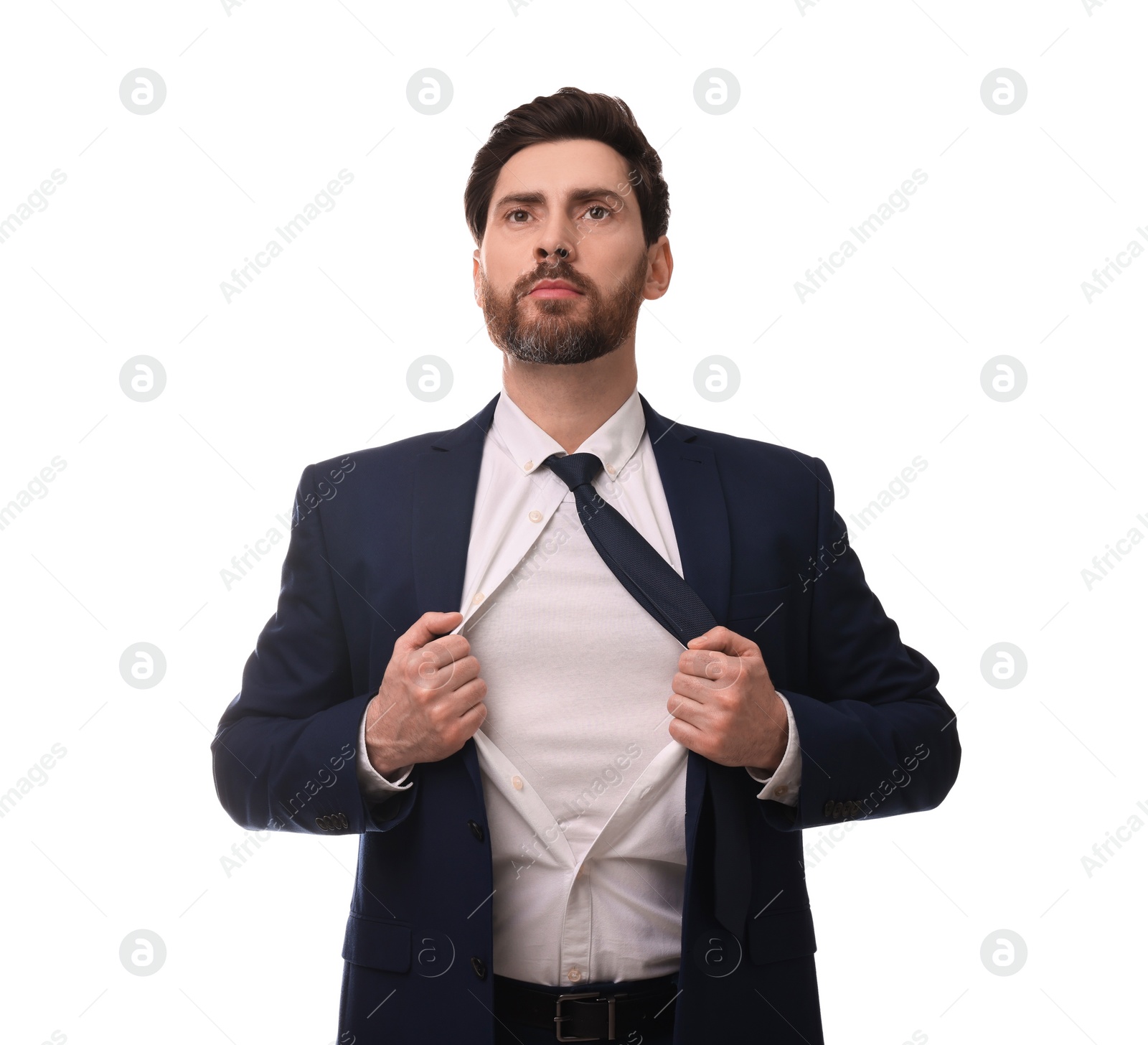 Photo of Confident businessman wearing superhero costume under suit on white background