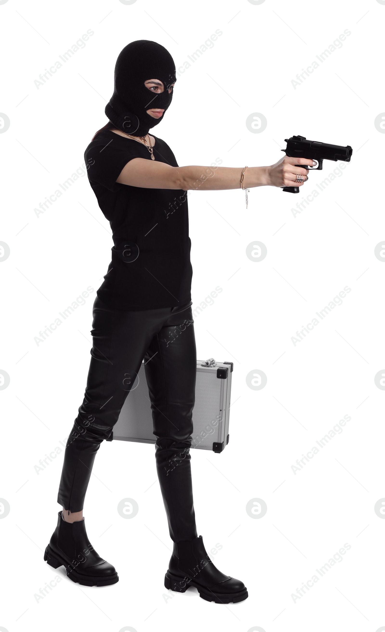 Photo of Woman wearing knitted balaclava with metal briefcase and gun on white background