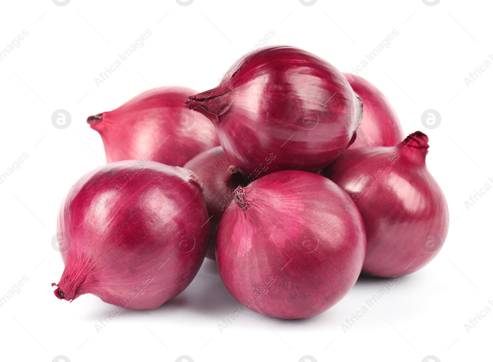 Photo of Fresh whole red onions on white background