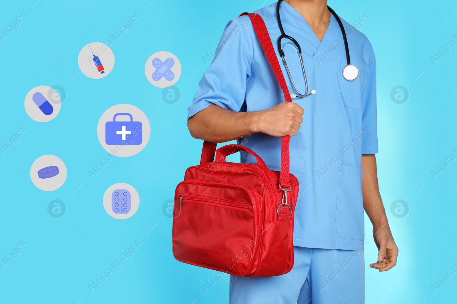 Image of Doctor with first aid kit on light blue background, closeup