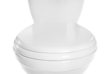 Photo of New ceramic toilet bowl on white background, closeup