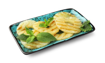 Photo of Tasty grilled pineapple slices and mint isolated on white