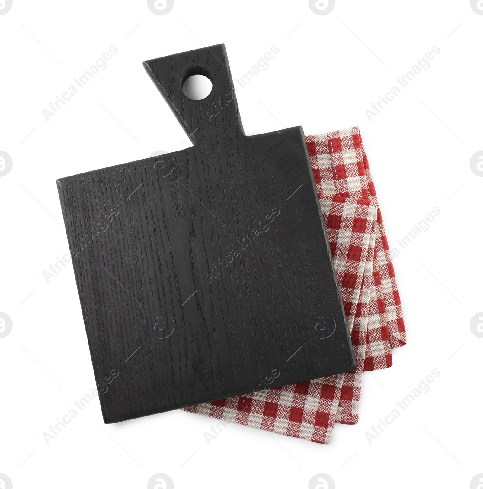 Photo of Black wooden cutting board and napkin isolated on white, top view