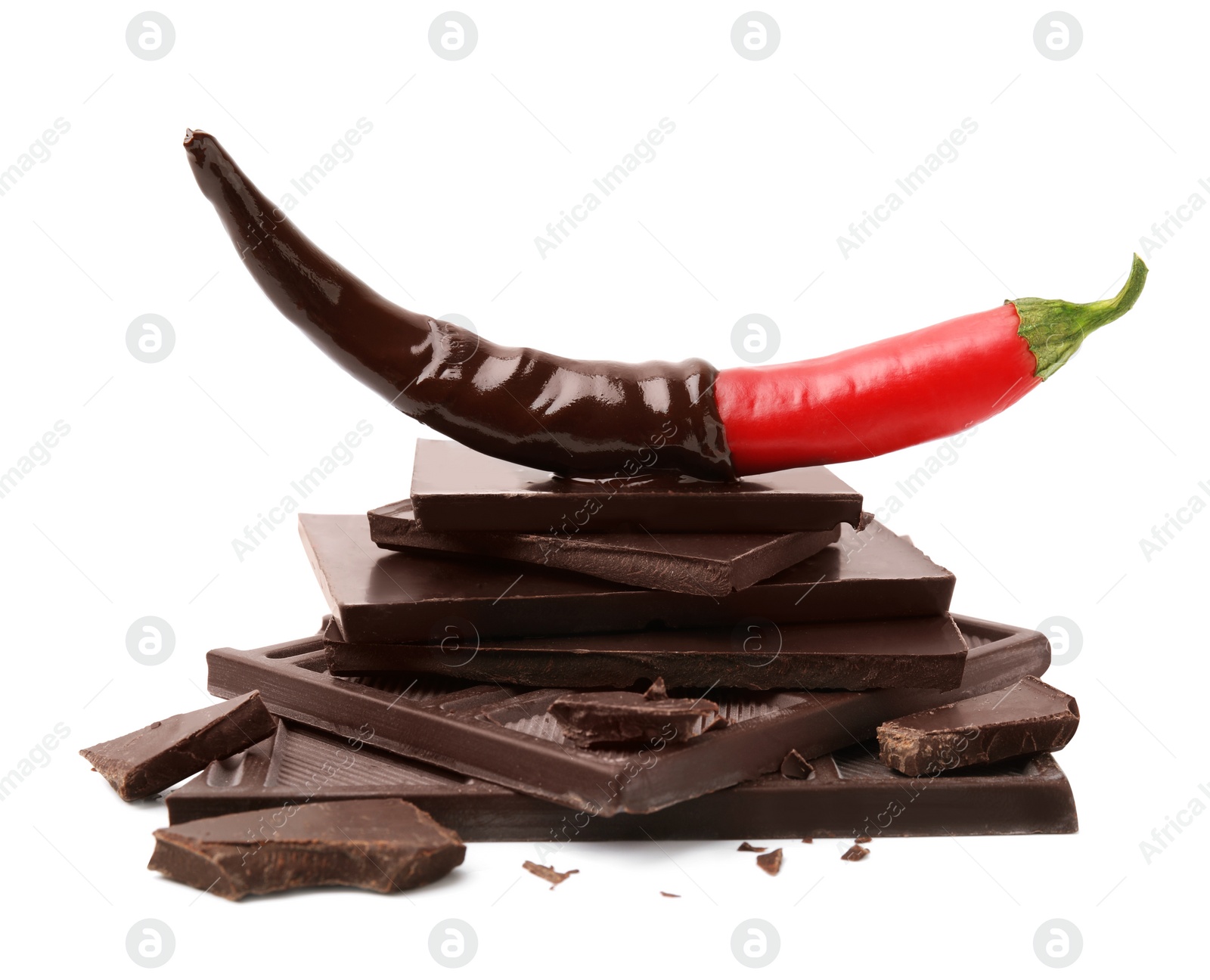 Photo of Red hot chili pepper and dark chocolate isolated on white