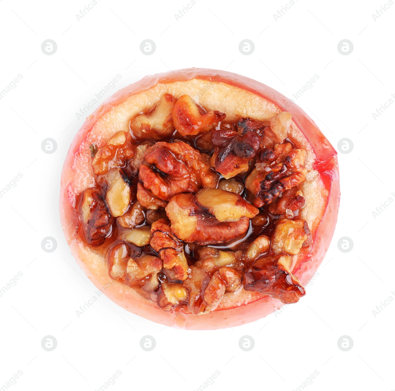 Photo of Tasty baked apple with nuts isolated on white, top view