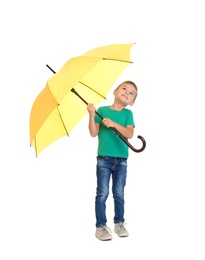 Photo of Little boy with yellow umbrella on white background