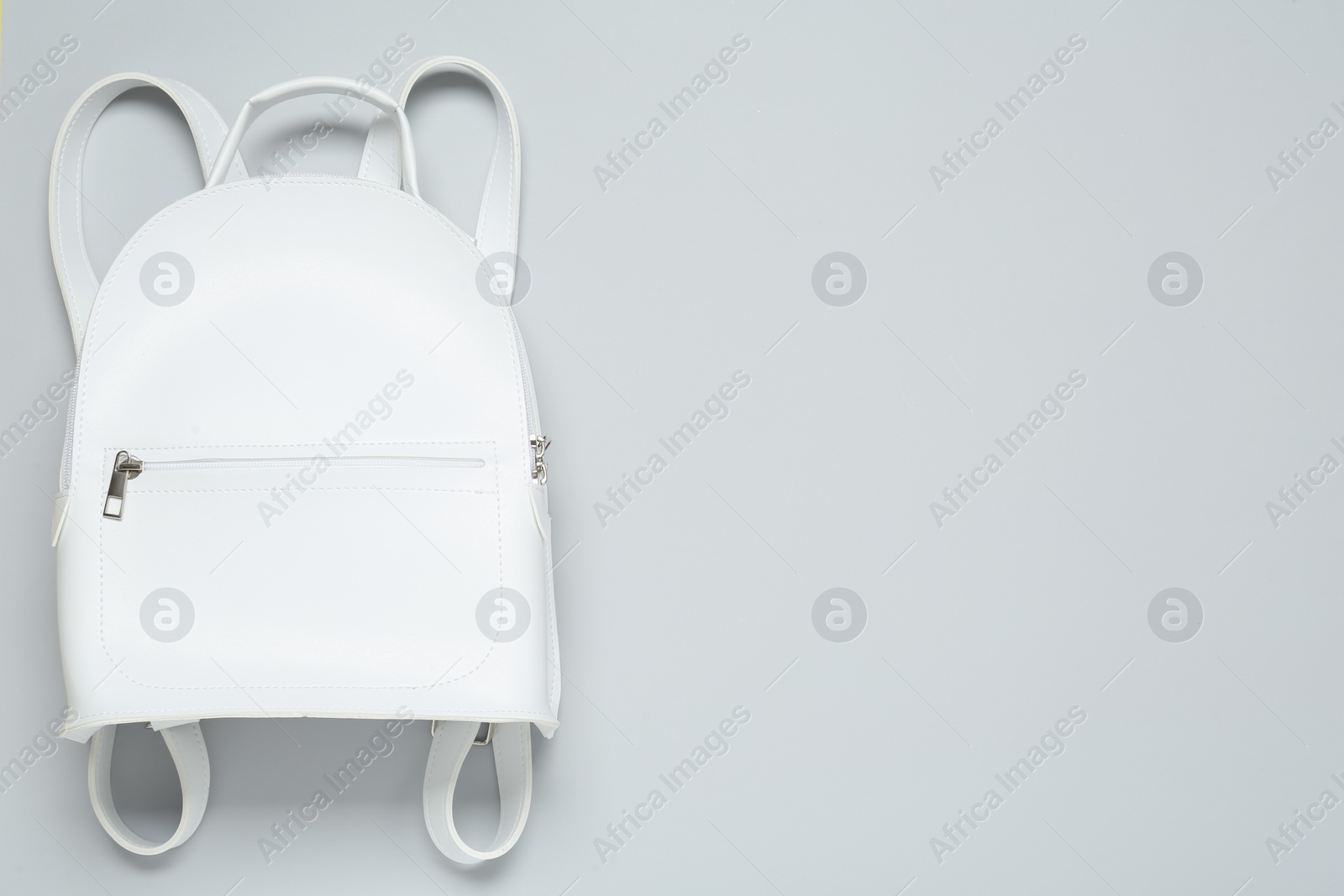 Photo of Stylish urban backpack on white background, top view