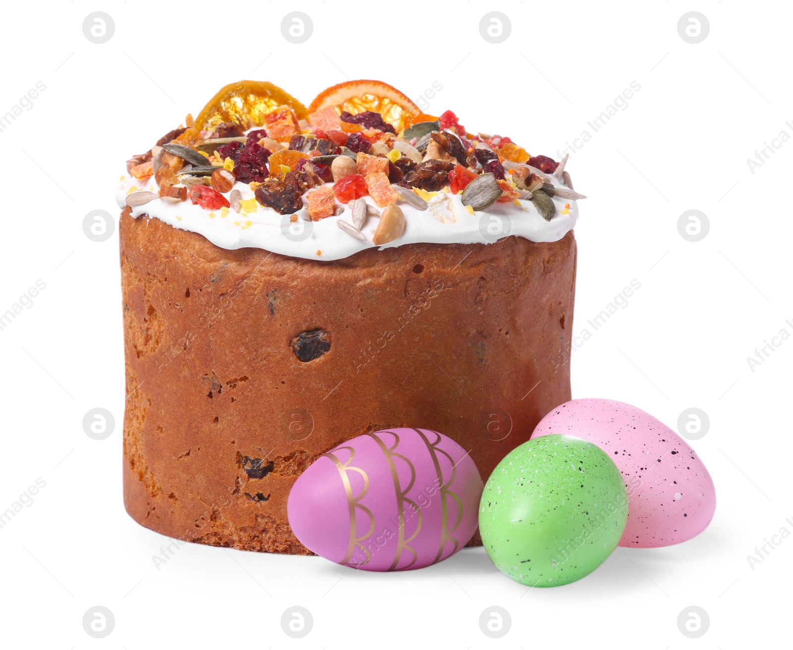 Photo of Traditional Easter cake with dried fruits and painted eggs isolated on white