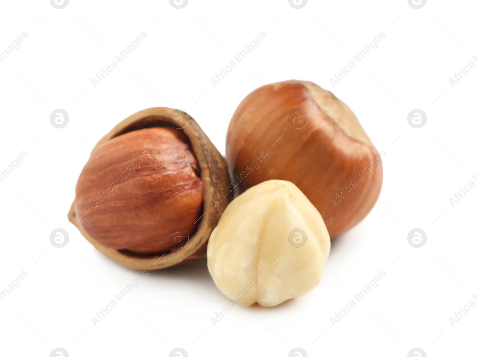 Photo of Tasty organic hazelnuts on white background. Healthy snack