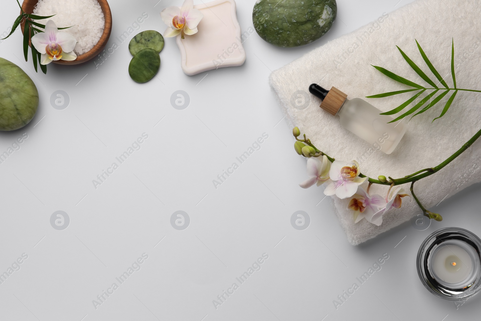 Photo of Flat lay composition with different spa products on white background. Space for text