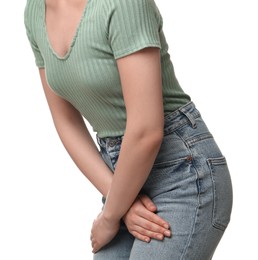 Photo of Woman suffering from cystitis on white background, closeup