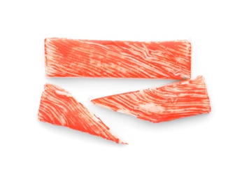 Photo of Cut and whole crab sticks isolated on white, top view