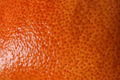 Photo of Ripe orange as background, closeup. Citrus fruit