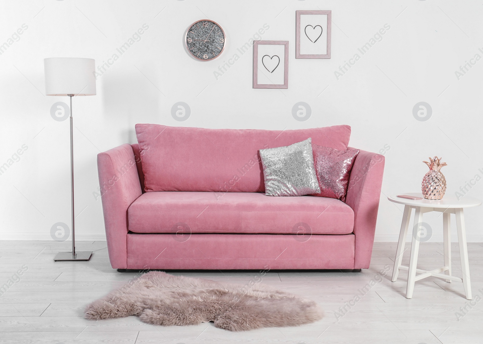 Photo of Comfortable sofa with pillows in modern living room interior