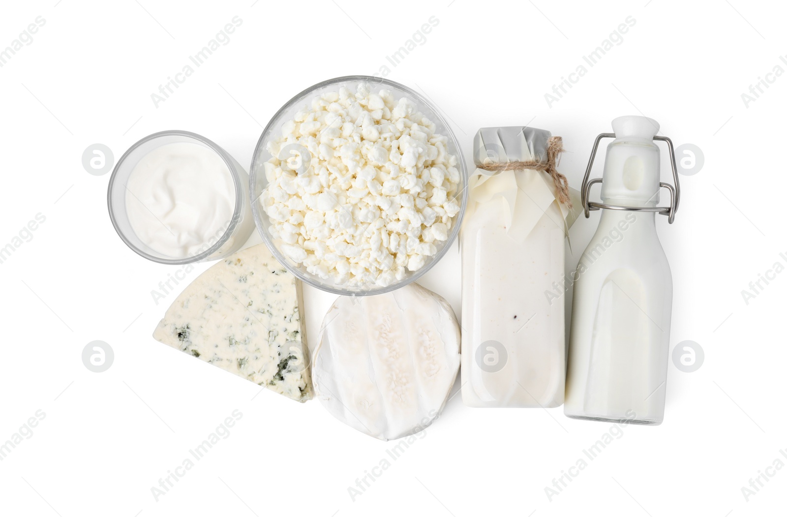 Photo of Different fresh dairy products isolated on white, top view