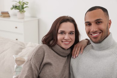 Photo of Dating agency. Happy couple enjoying time together at home