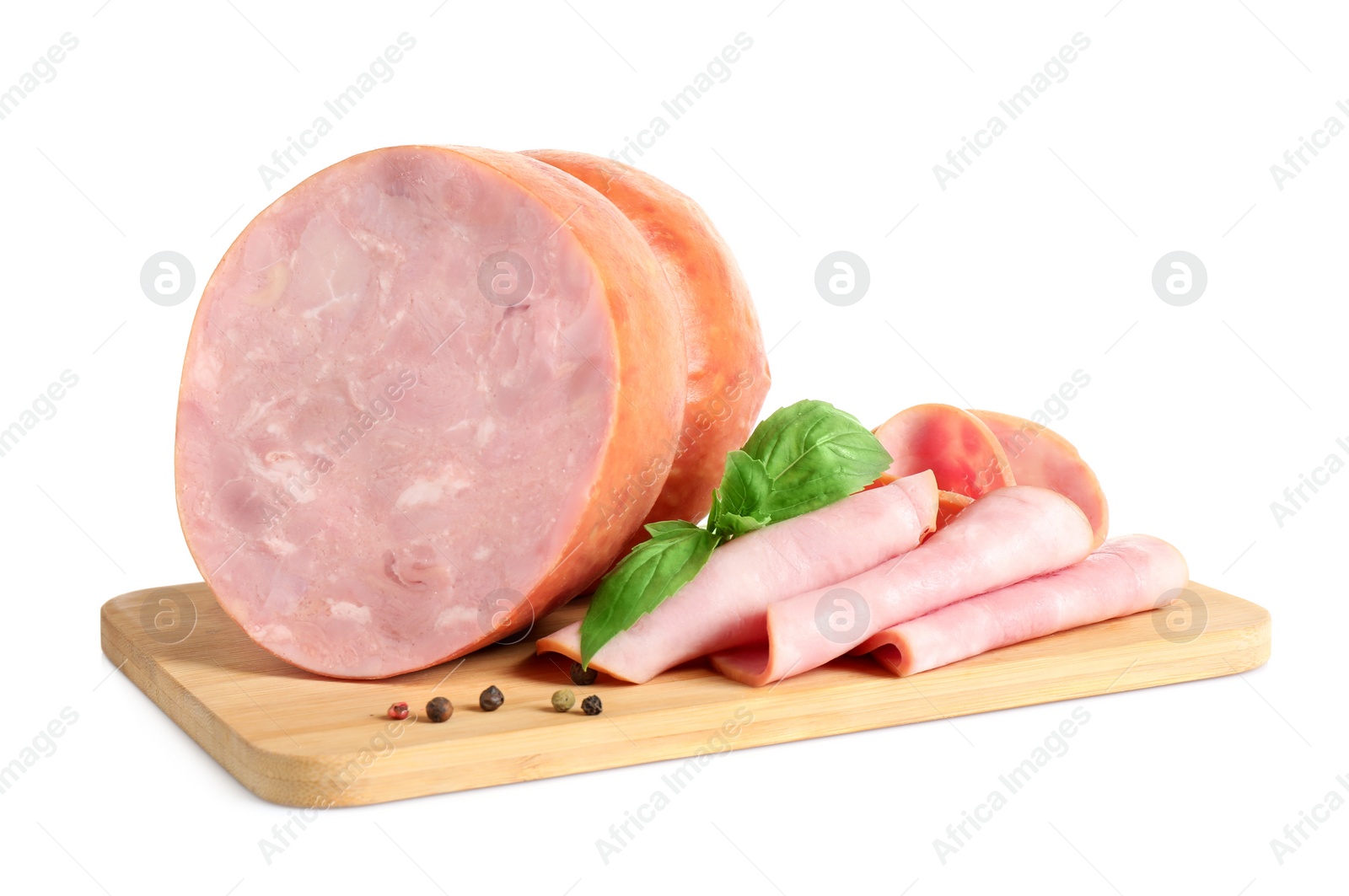 Photo of Tasty ham with basil and pepper on wooden board, white background