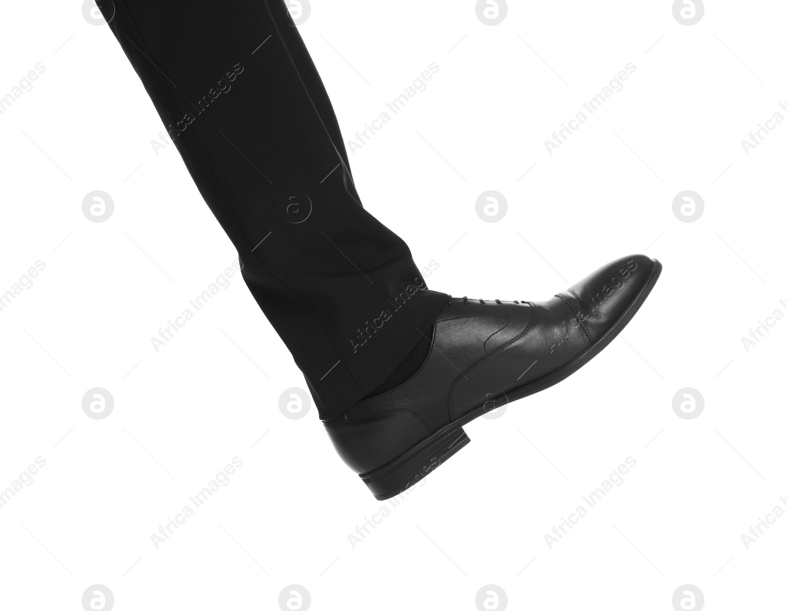 Photo of Businessman in leather shoes on white background, closeup