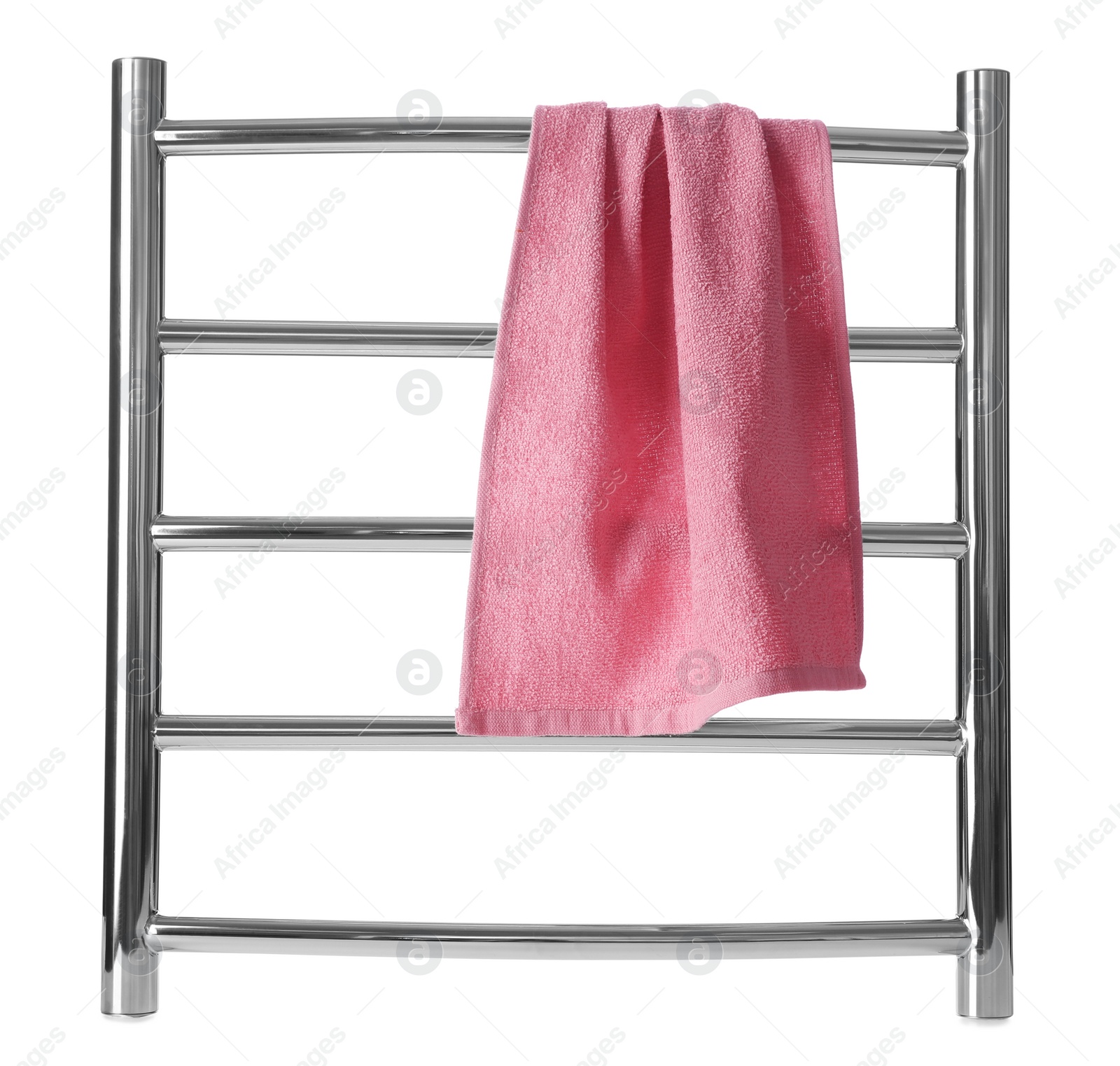 Photo of Modern heated towel rail with warm soft towel isolated on white