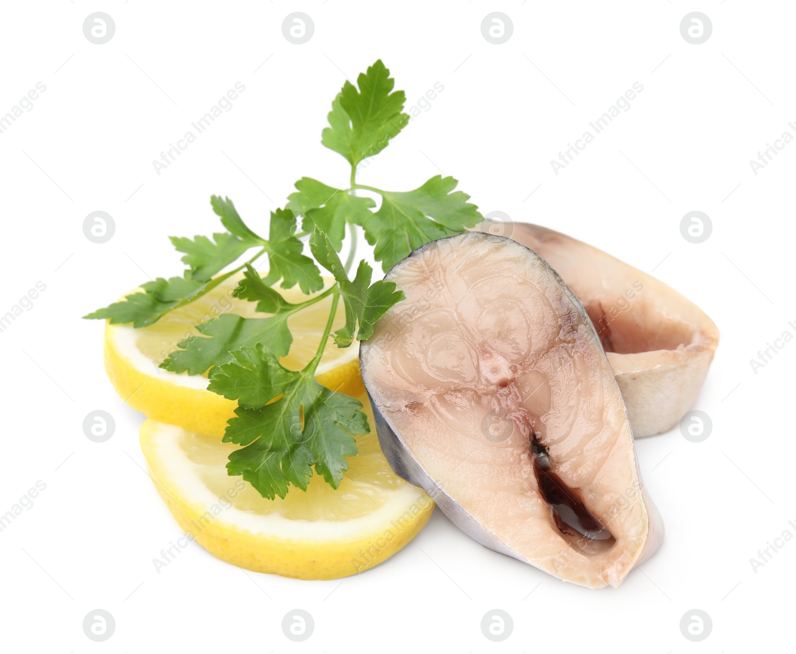 Photo of Pieces of mackerel fish with parsley and lemon on white background