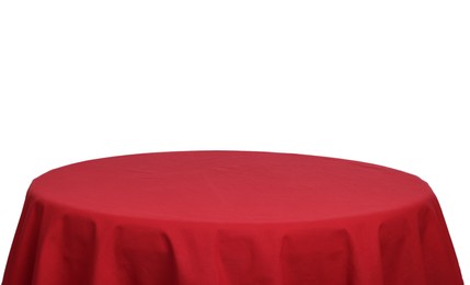 Photo of Empty table with red tablecloth isolated on white