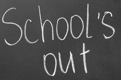 Photo of Words School's Out on blackboard. Summer holidays