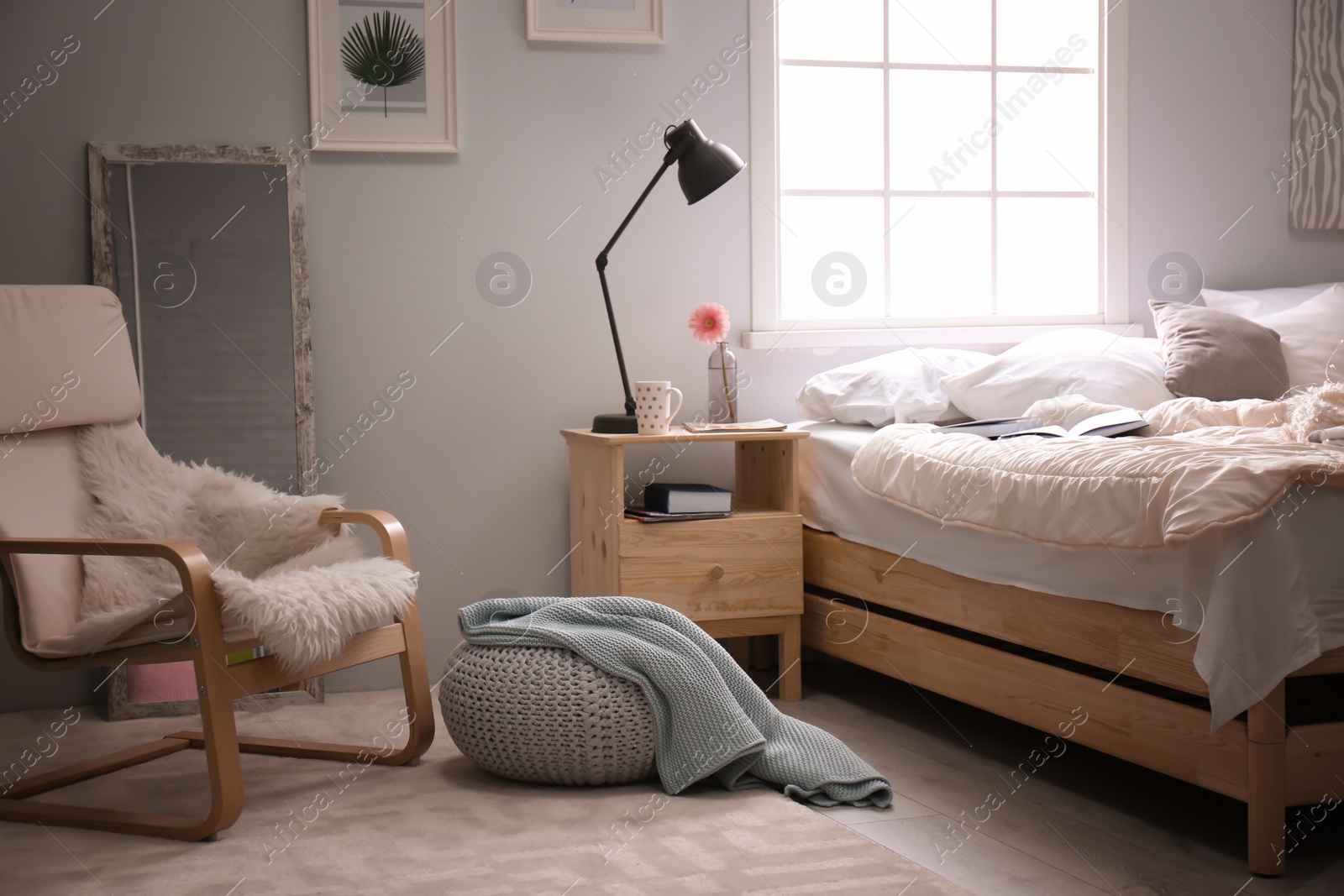 Photo of Stylish interior with comfortable bed
