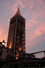 BATUMI, GEORGIA - MAY 31, 2022: Beautiful Piazza Boutique Hotel against colorful twilight sky
