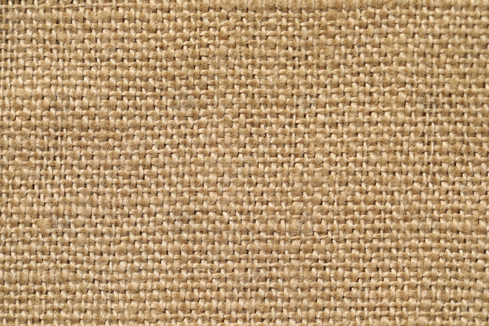 Photo of Texture of beige fabric as background, top view