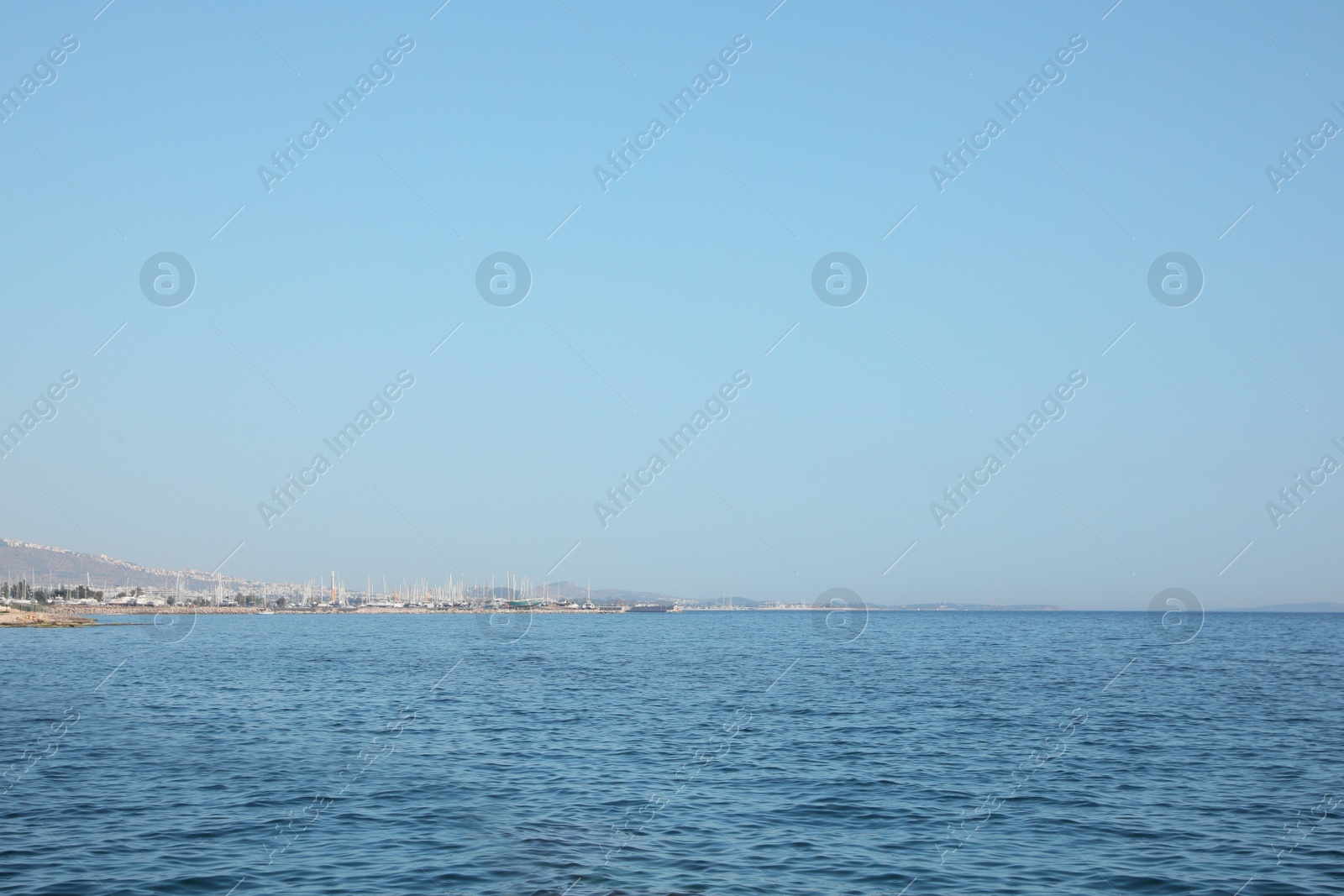 Photo of Picturesque seascape with coastline on sunny day