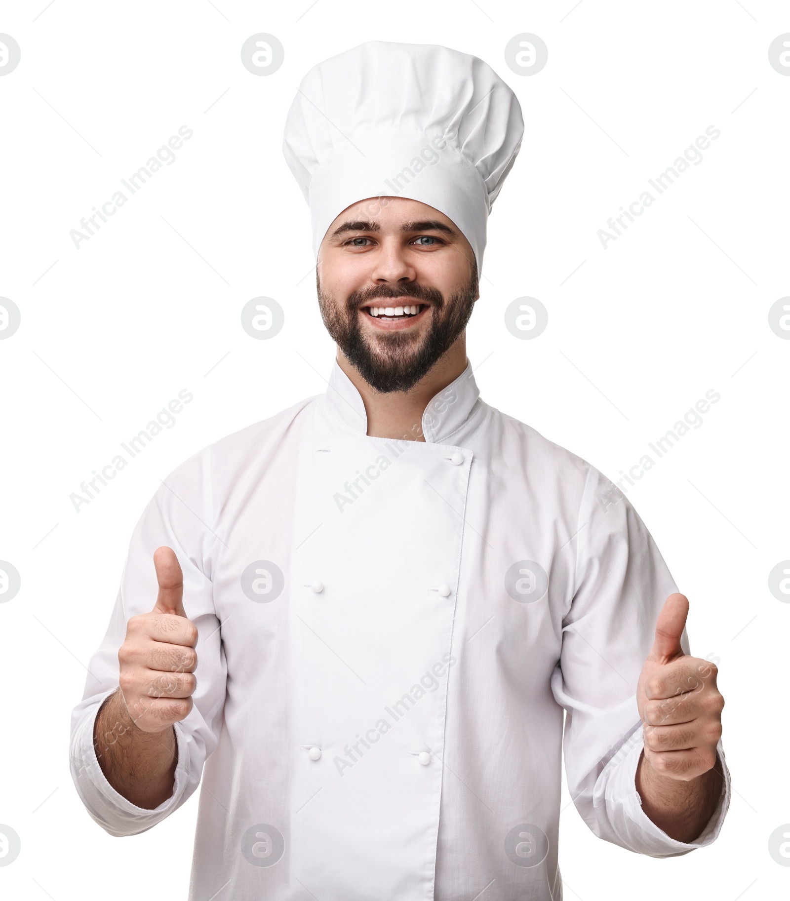 Photo of Happy young chef in uniform showing thumbs up on white background