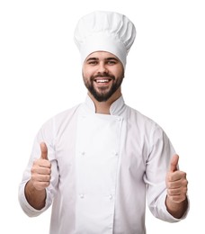 Photo of Happy young chef in uniform showing thumbs up on white background